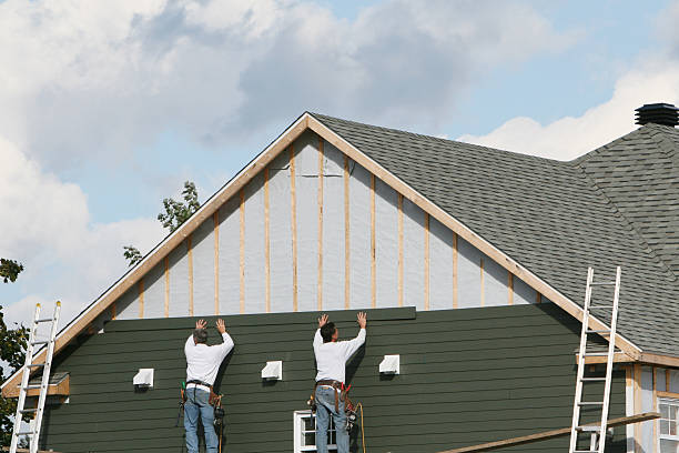 Professional Storm Damage Siding Repair technician working in Metamora, IL